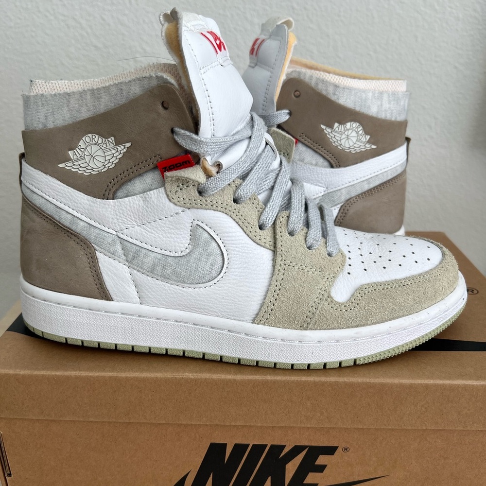 Nike Woman Air Jordan Mid-Tops in White and Grey Heather Olive
